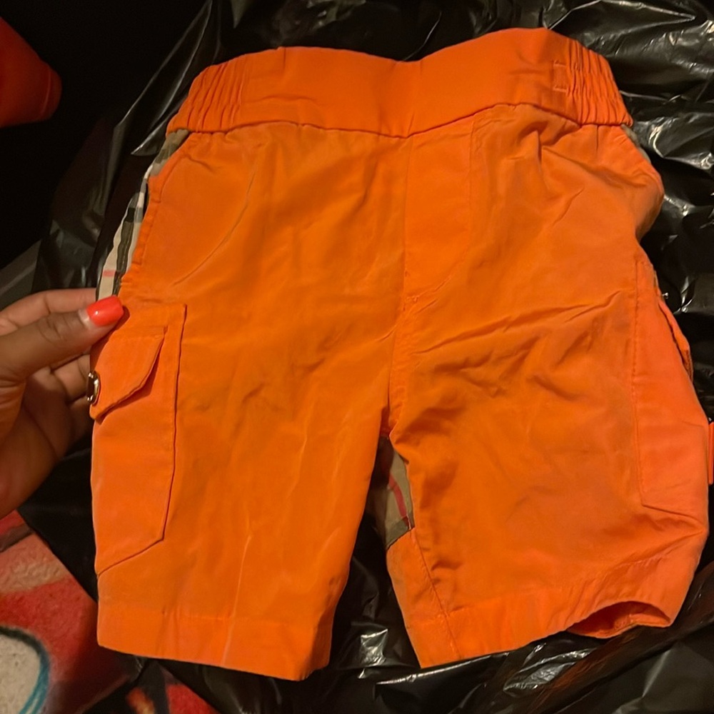 Orange Burberry shorts